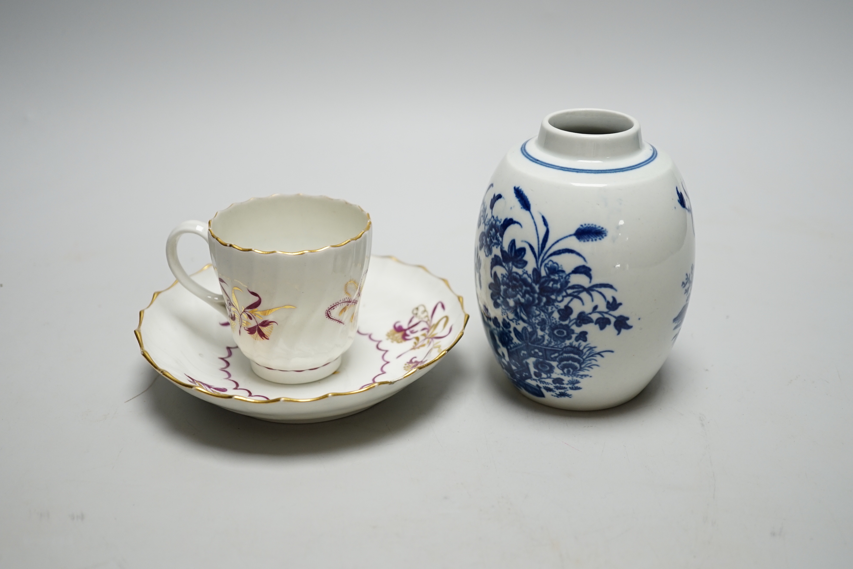 A Worcester Fence pattern tea canister, c.1775, and a Worcester wrythen coffee cup and saucer, c.1795
